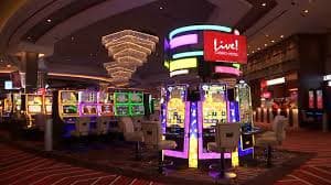 Antarmuka permainan Sugar Rush di aplikasi mobile vegas gg dengan tema manis dan gulungan berwarna-warni